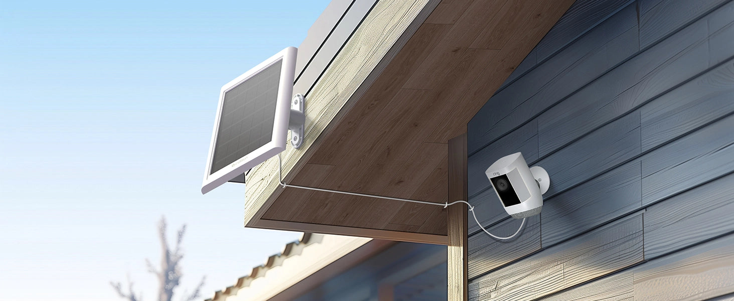 Callsun 2.4W solar panel mounted outside under a wooden roof eave, wired to an outdoor security camera.