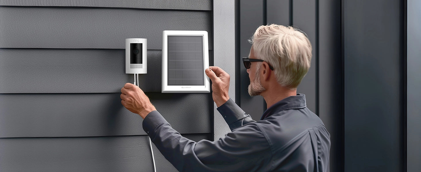 Callsun 2.4W solar panel being installed outdoors on a house wall next to a Ring security camera by a user.